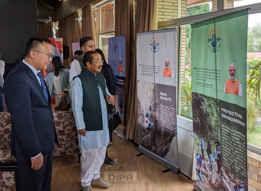 Advisor IPR and S & WC, Imkong L Imchen inspecting the exhibition put up by the Central Bureau of Communication, Kohima in commemoration of the 100th episode of Prime Minister's Mann Ki Baat at Raj Bhavan, Kohima on April 30. (DIPR Photo)